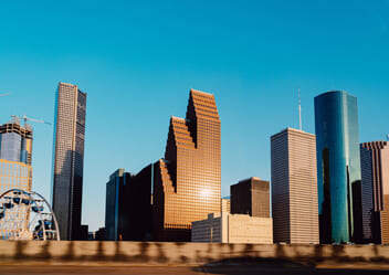 View of sun reflecting off buildings in Houston, Texas downtown